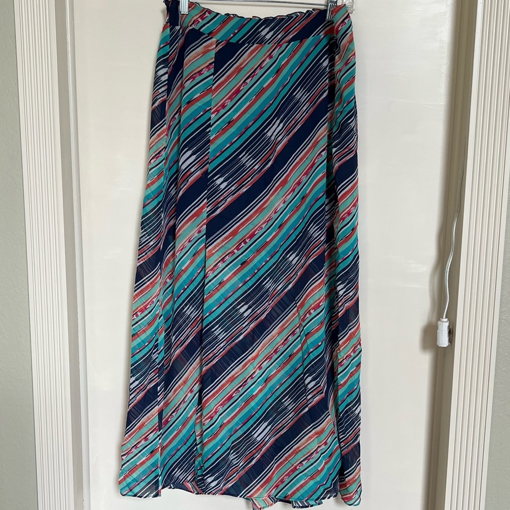 Striped multi color maxi skirt with double slit.